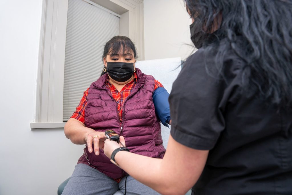 Patient is being examined by health worker