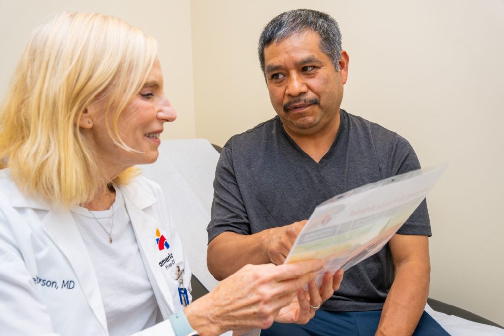 Patient Ruben doesn’t need a specialist, but if he does, Dr. Gerson will have a specialty consult as close as her computer.