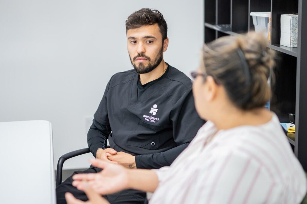 Maria, a patient at the Bob Macauley Americares Free Clinic of Norwalk, benefits from multiple health programs at AFC, including health coaching. With lifestyle changes and medication adherence to address diabetes and hypertension, Maria now enjoys general well-being. Maria is shown here with Americares Free Clinics Health Coach, Joshua Rodriguez, R.D. July 3, 2024. (Photo/Andrea Pane)